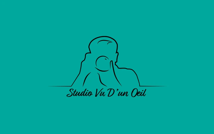 monochromatic black version of the logo on blue-green background